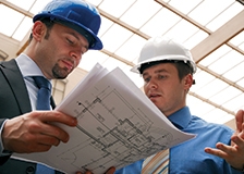 77704_fullimage_10319_Contractors_discussing_building_design.jpg